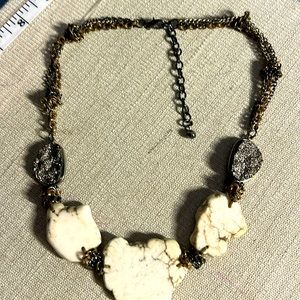 Costume necklace with howlite  stone in a black and bronze metal chain